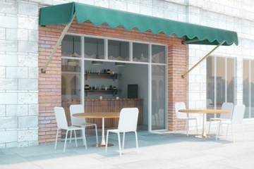 An awning over outdoor tables.